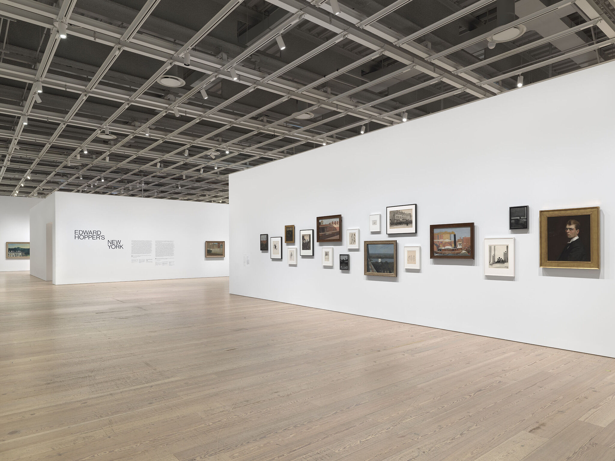 Gallery walls with artwork hung up. 