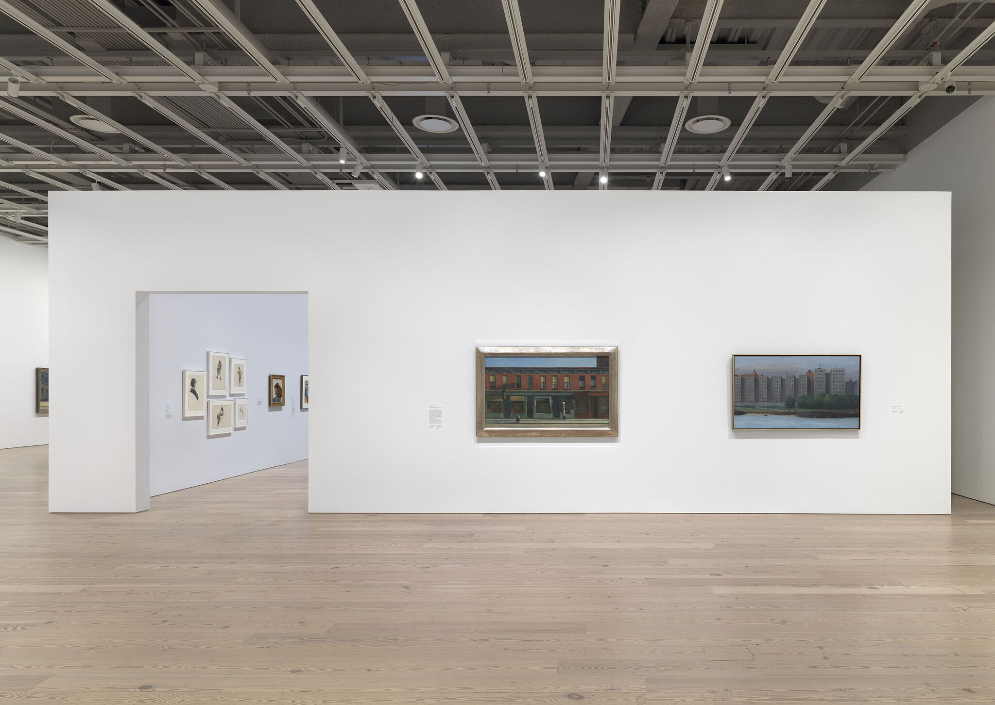Gallery walls with artwork hung up. 
