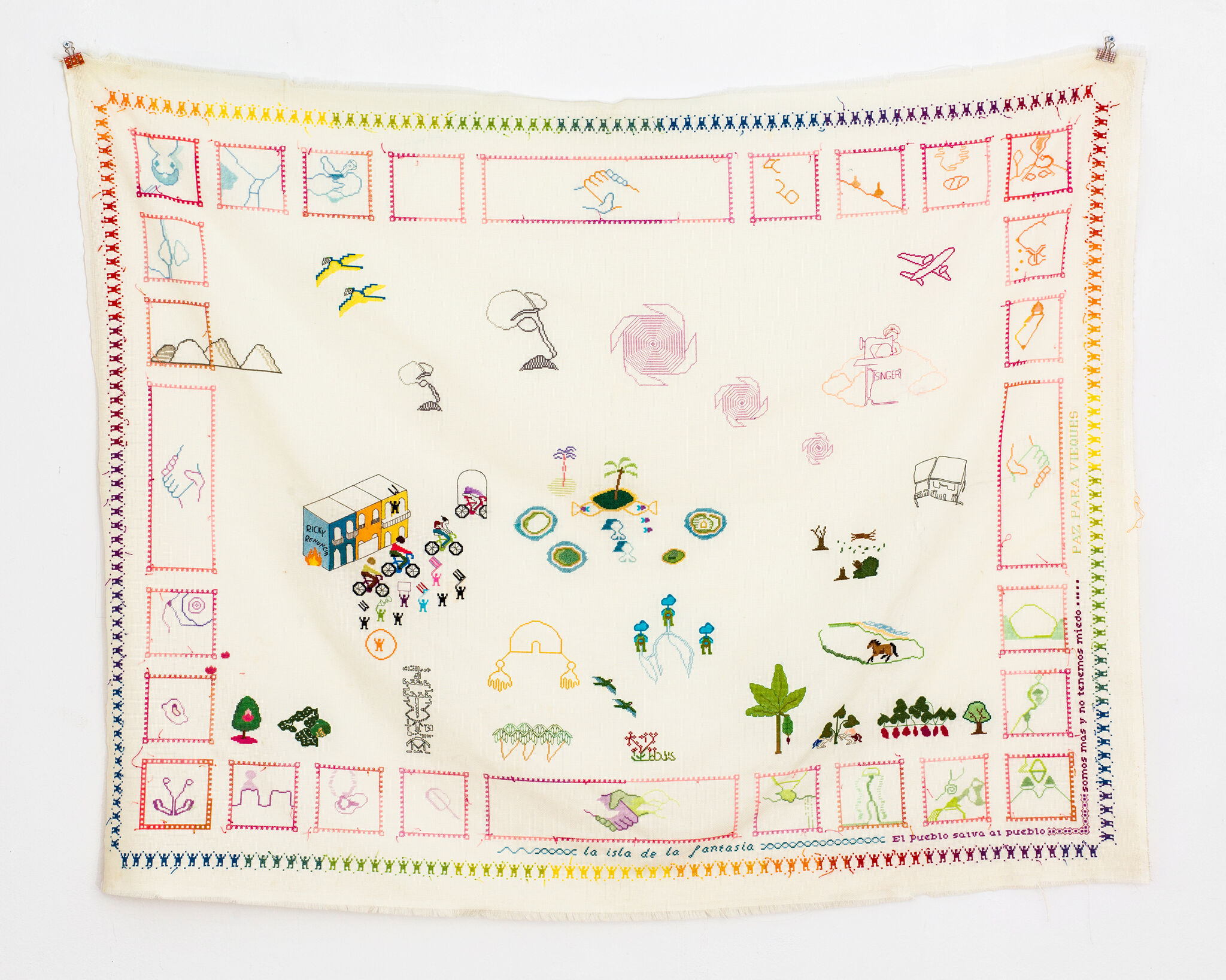 A colorfully-embroidered map.