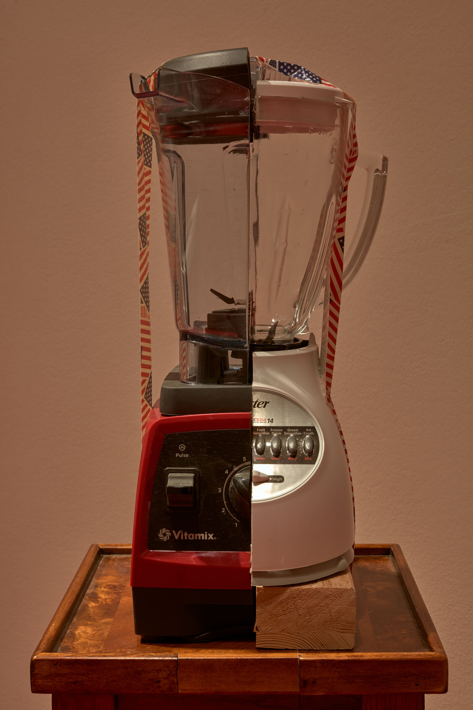 Half of two different blenders pushed together to make one new blender. 