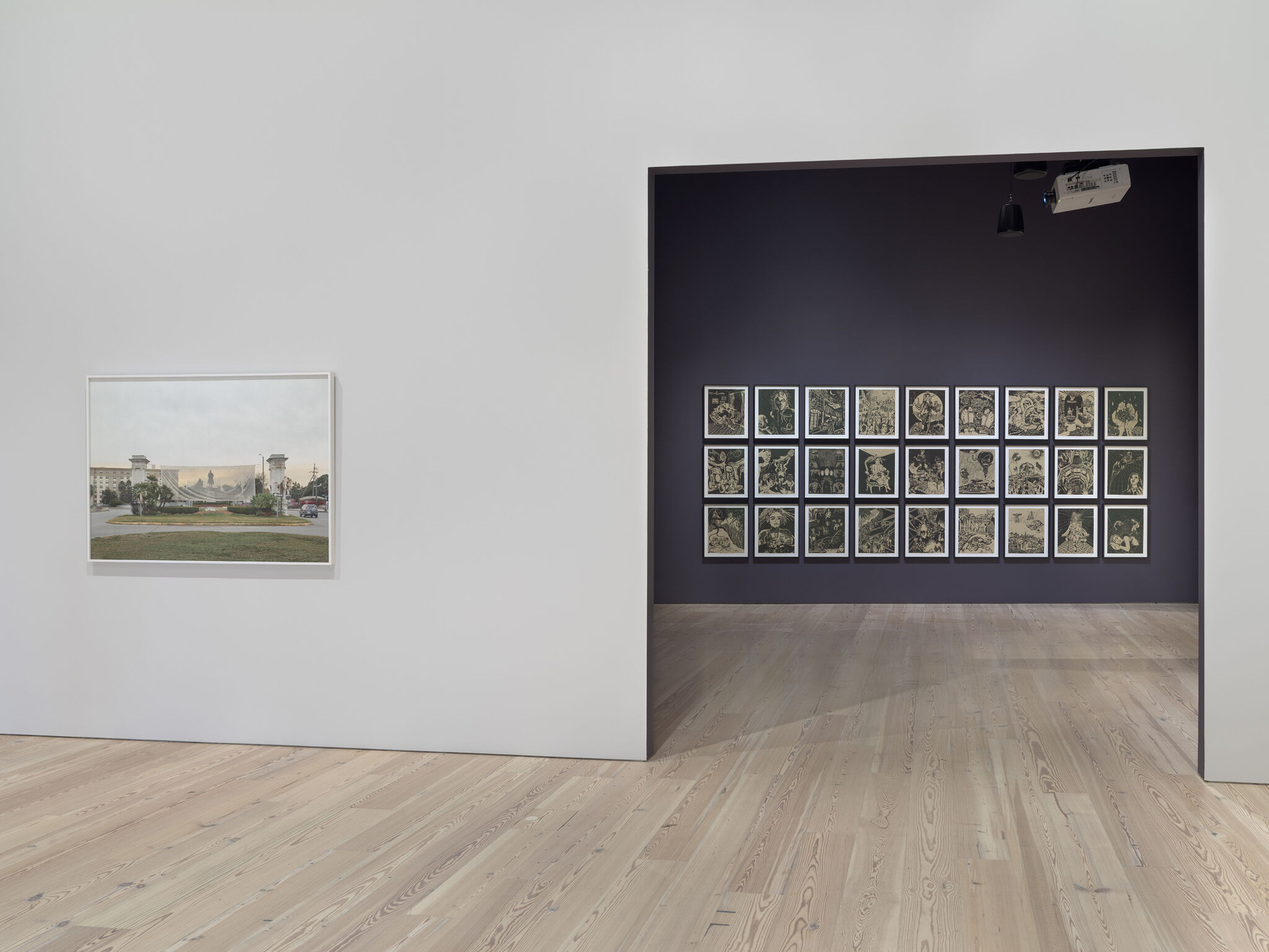 On the left, a photograph of a landscape monument, and on the right, a room with purple walls and multiple framed tan and black paintings.