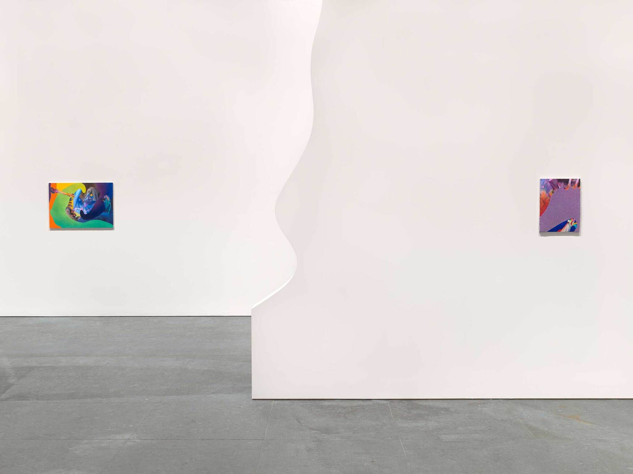 Two smaller vivid abstract paintings on different walls. The wall in the foreground has an abstract squiggle edge.
