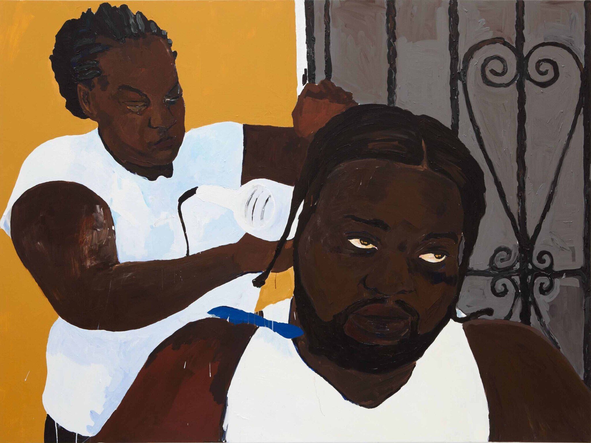 A bearded dark skinned man sits in the foreground while an older woman stands behind him, to the left of the painting. She holds a white hairdryer to his hair. The left half of the background is mustard yellow. On the right half is a black, gate-like metal door with decorative twists and swirls.