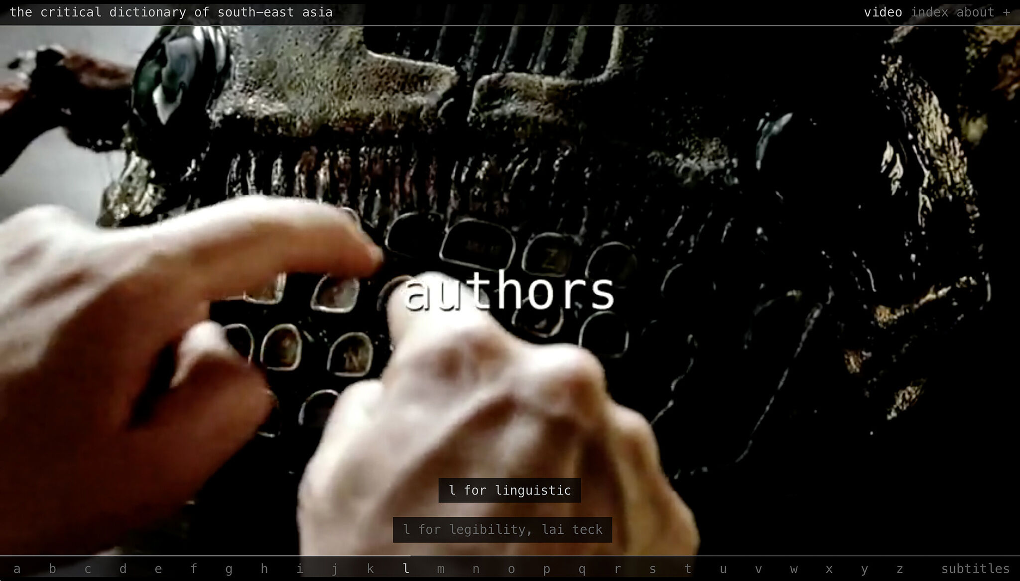 Hands typing on an old typewriter with the word "authors" on the screen, part of an interactive website menu.