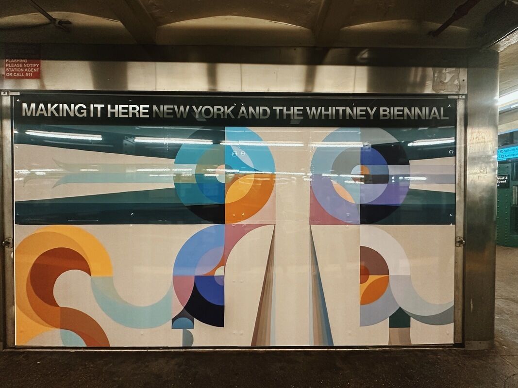 Colorful abstract mural in a subway station with the text "Making It Here New York and the Whitney Biennial" at the top.