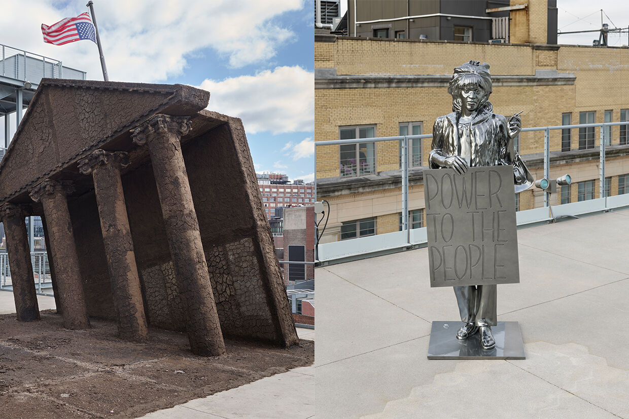 Two outdoor sculptures: a tilted, cracked building with an American flag, and a metallic figure holding a "Power to the People" sign.