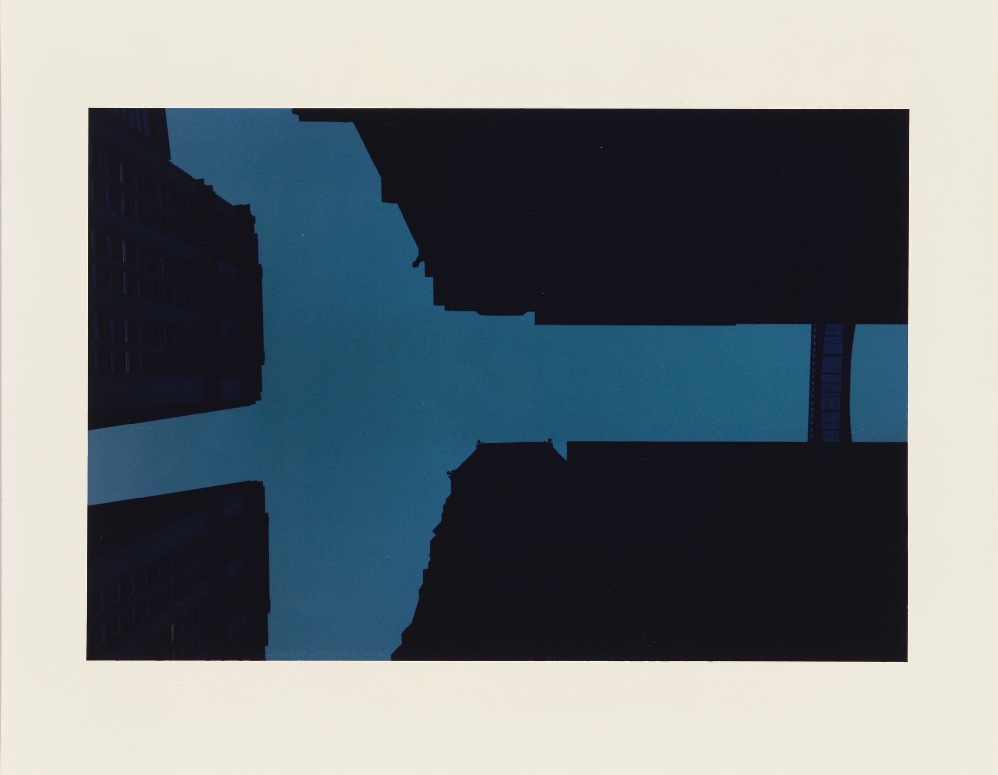  A Cut-Out Sky (Thames St., between Broadway & Trinity Pl. N.Y.C.) in a Chromogenic print.