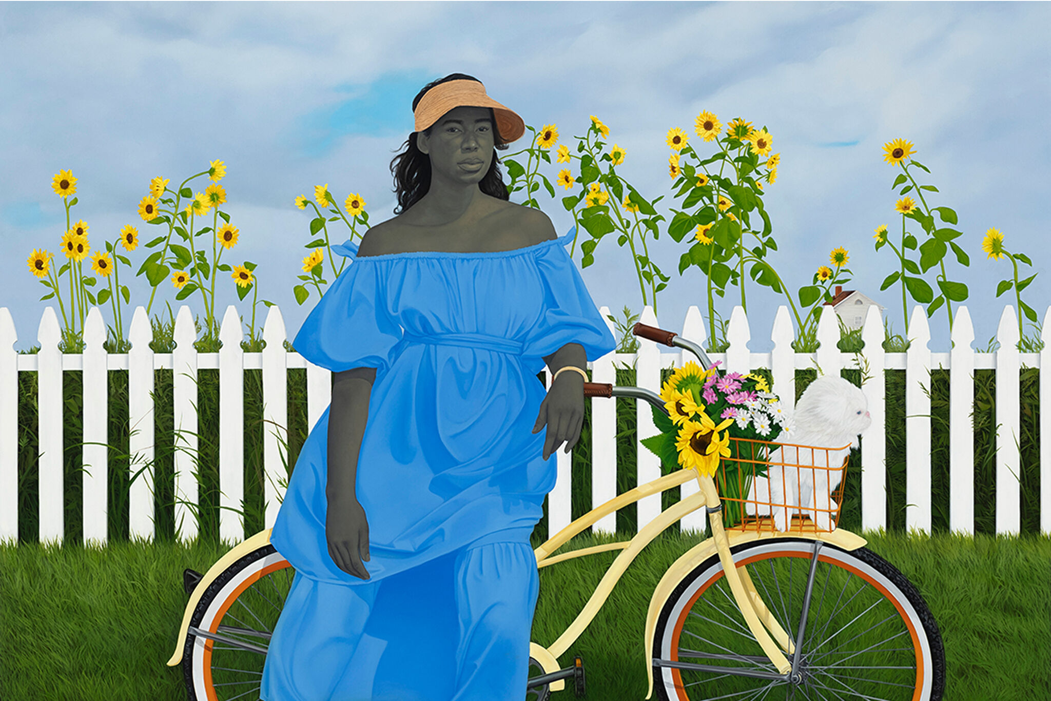 Woman centered in blue sundress blowing in the wind. She wears a tan visor and leans against a bicycle. In the background is soft green grass, a white picket fence, and sunflowers blooming.