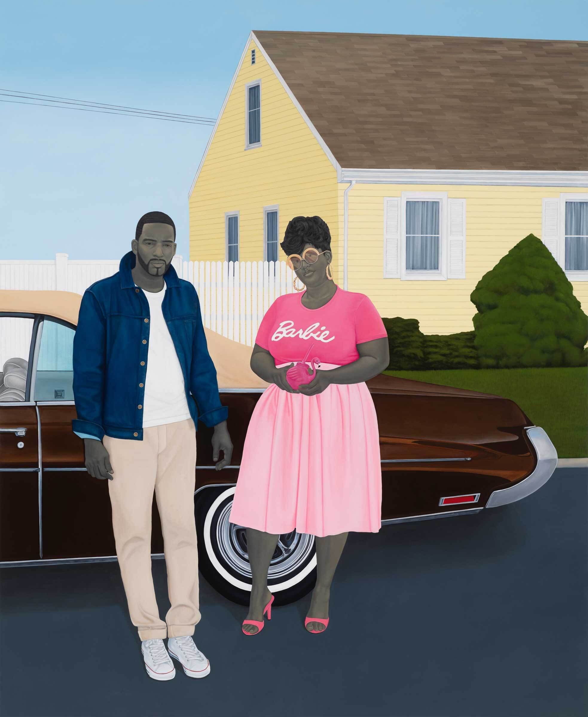 Two people stand by a vintage car in front of a yellow house. One wears a "Barbie" shirt.