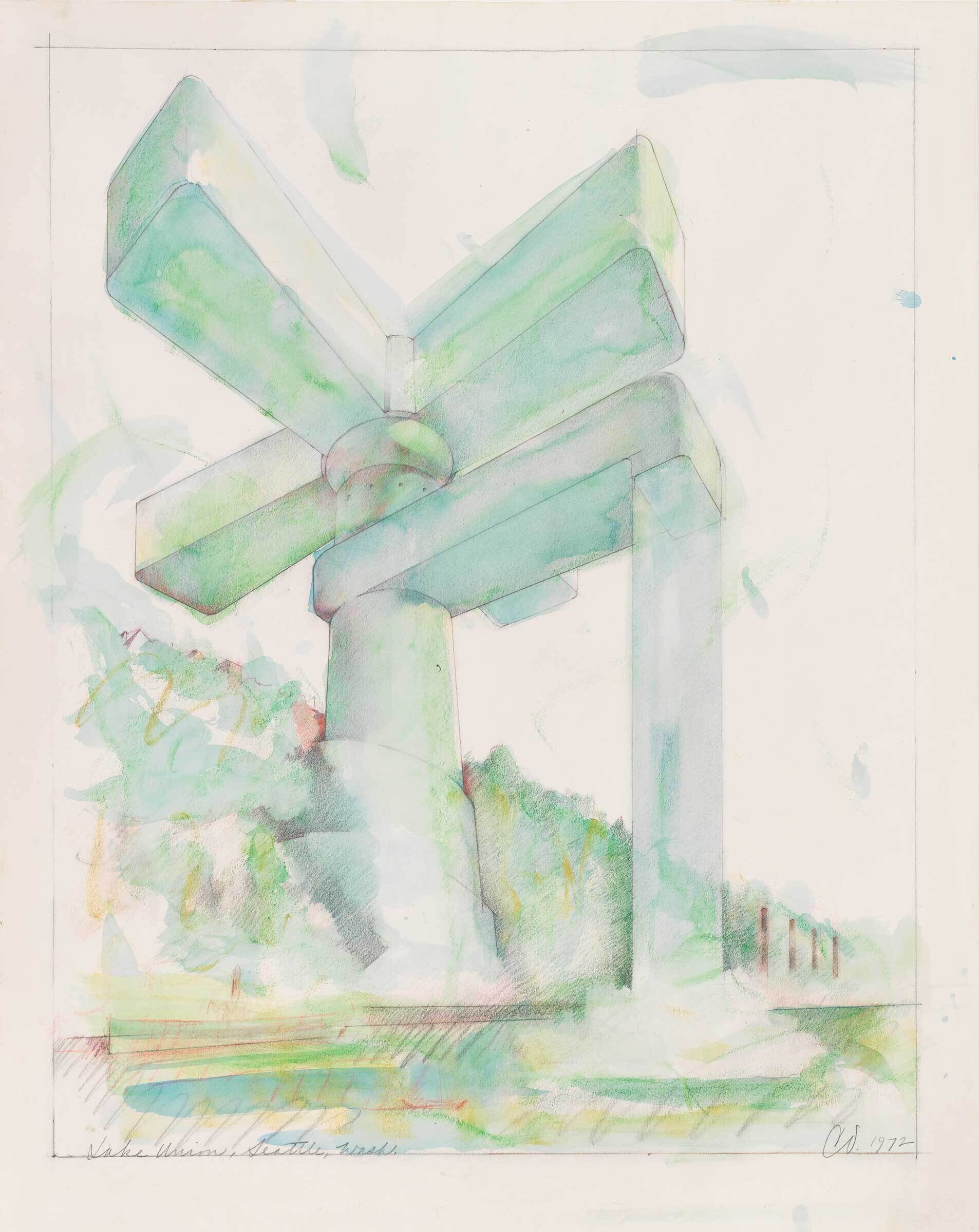 Large abstract sculpture with three thick arms on a central pillar, surrounded by trees and grass.