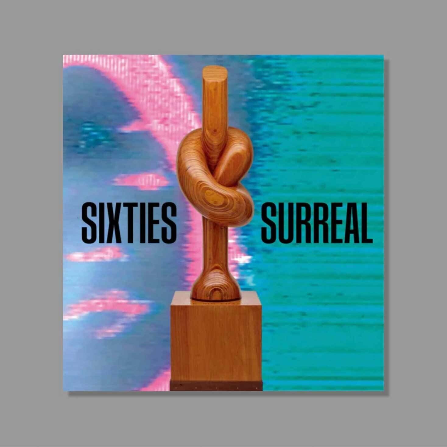 A wooden sculpture with a knot in the middle stands in front of colorful text reading “SIXTIES SURREAL.”