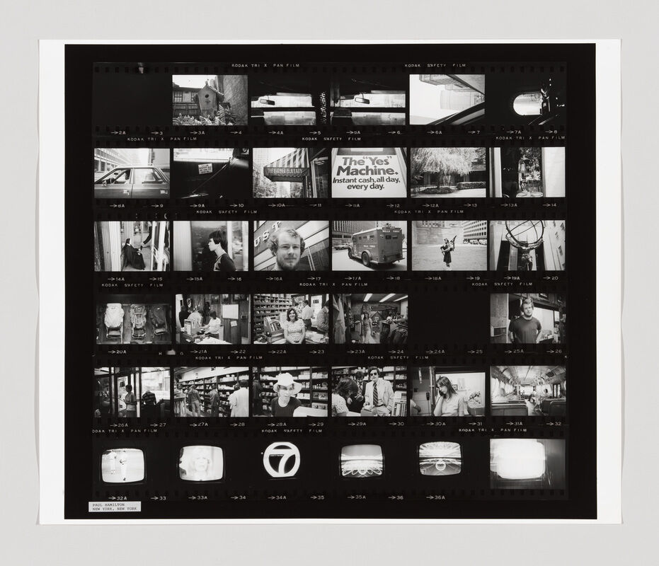 A black and white contact sheet shows multiple small photos, including people, city scenes, and a sign reading “The Yes Machine.”
