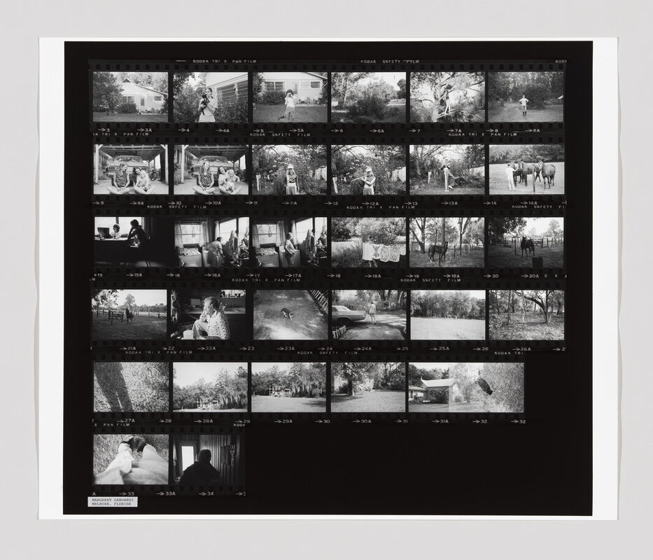 A contact sheet with multiple black-and-white photos showing people, animals, and outdoor scenes around a house.