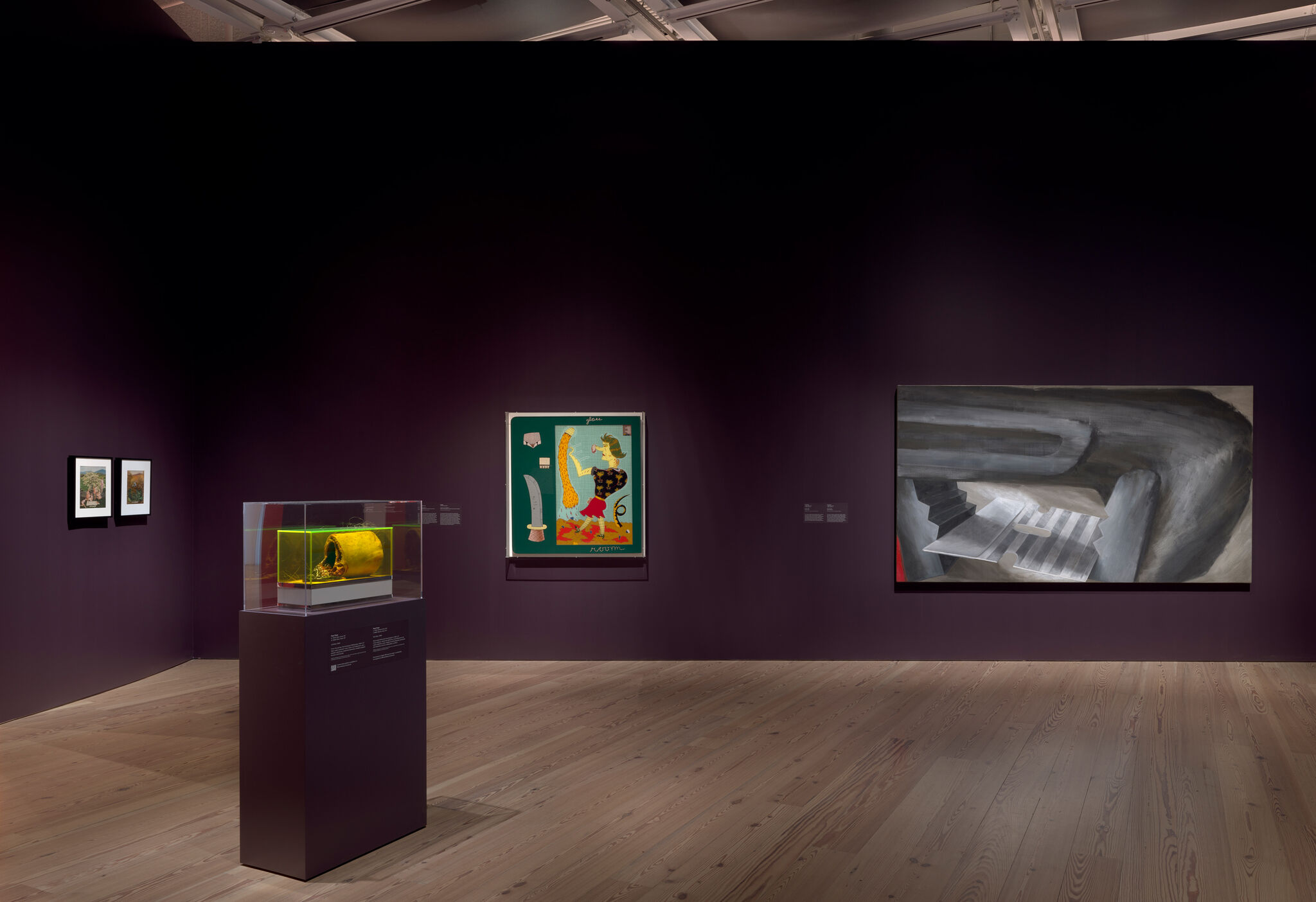 Museum gallery with paintings on deep purple walls and a protected glass case displaying a fluorescent yellow sculpture.