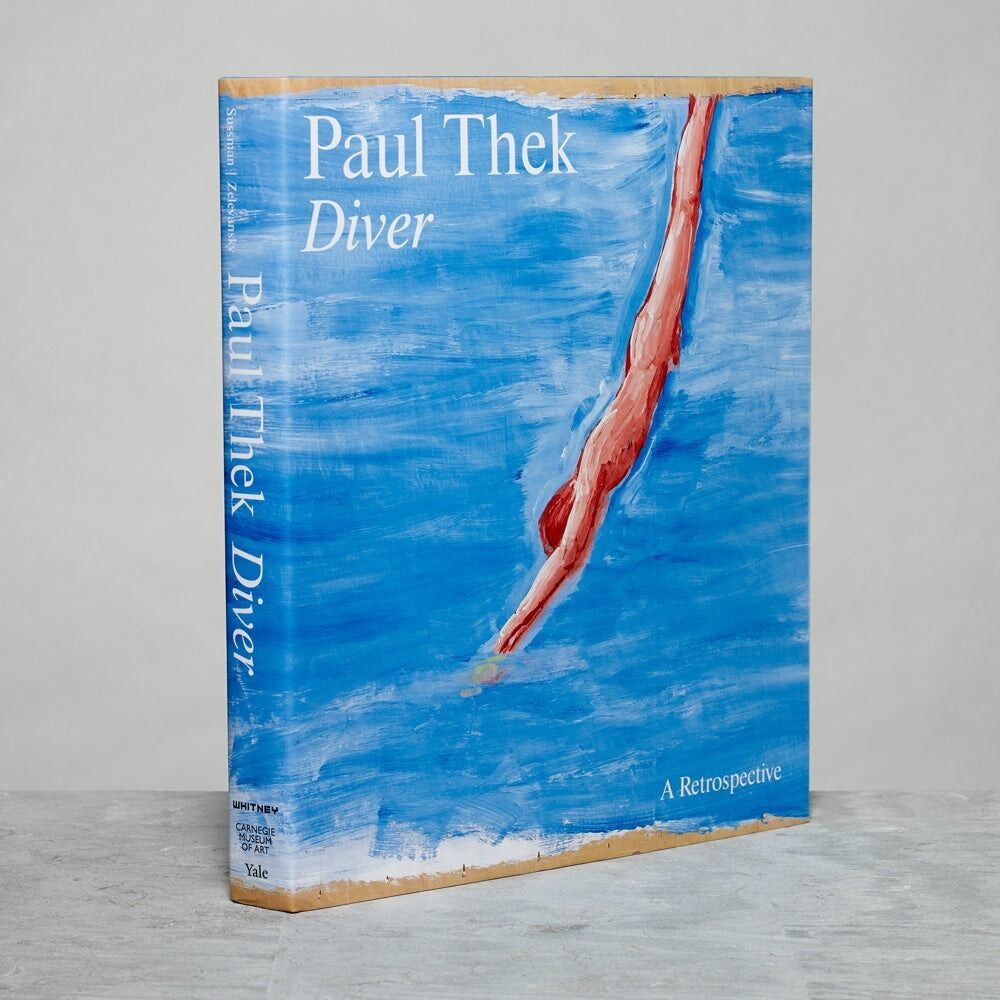 A book titled Paul Thek: Diver with a painted blue cover showing a diving figure.