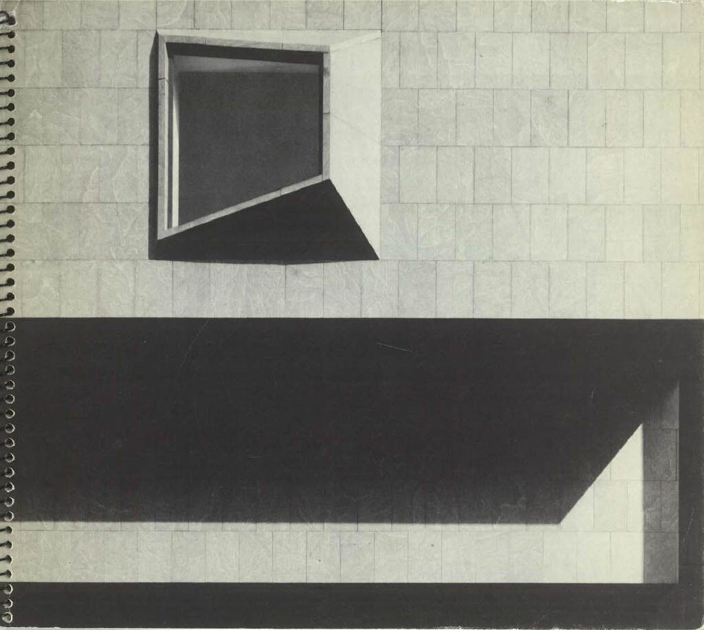 A spiral-bound book cover showing a close up of the stone side of the Whitney Museum's Madison building, with a window and shadows beneath an overhang visible.