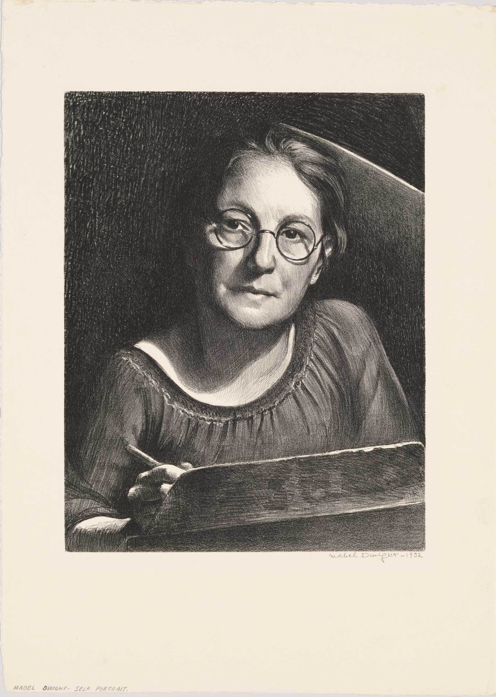 Woman wearing round glasses looks toward the viewer while holding a pencil and sketchbook.