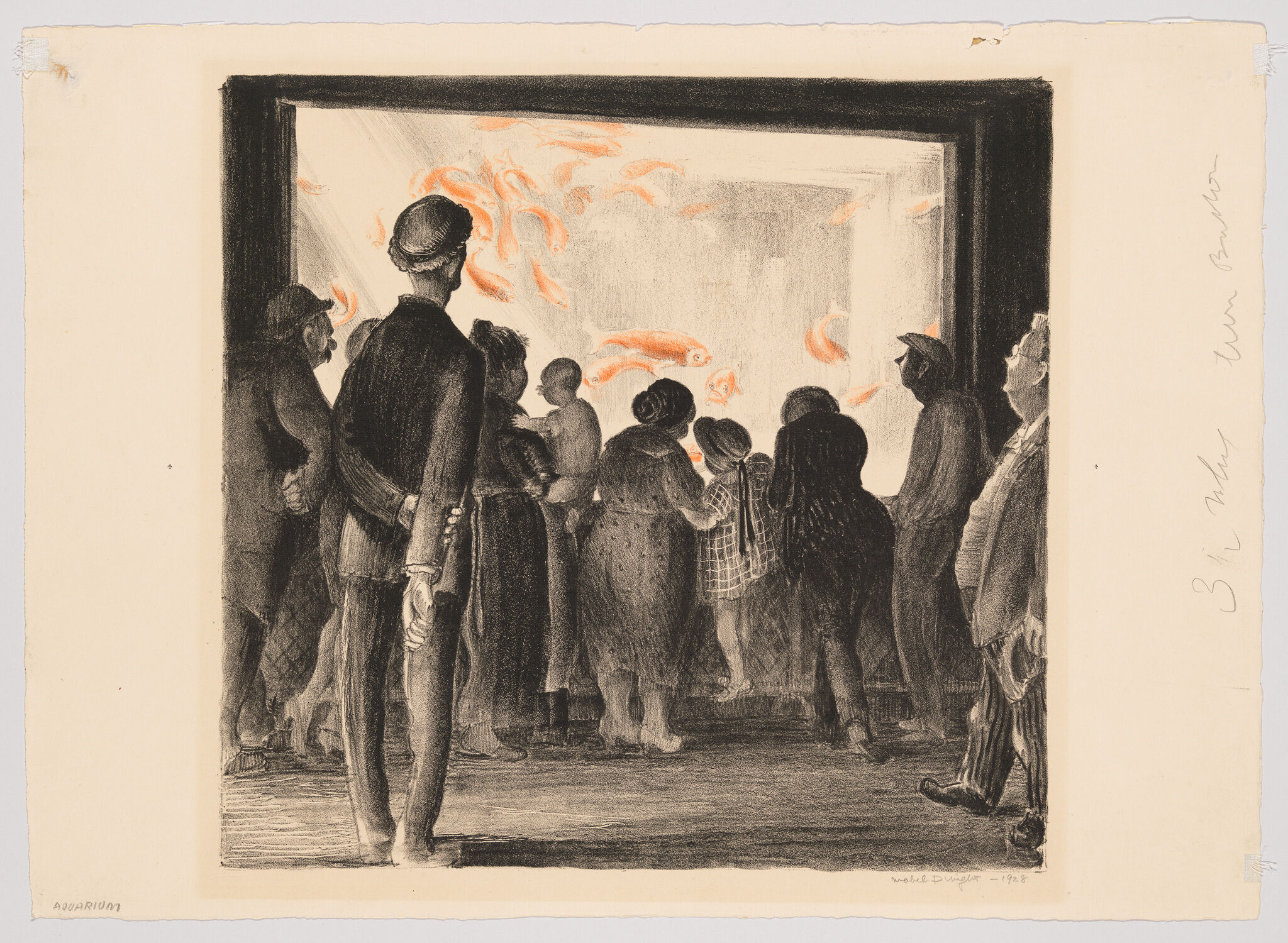 A crowd of people, including children, watches large orange fish through a glass aquarium.