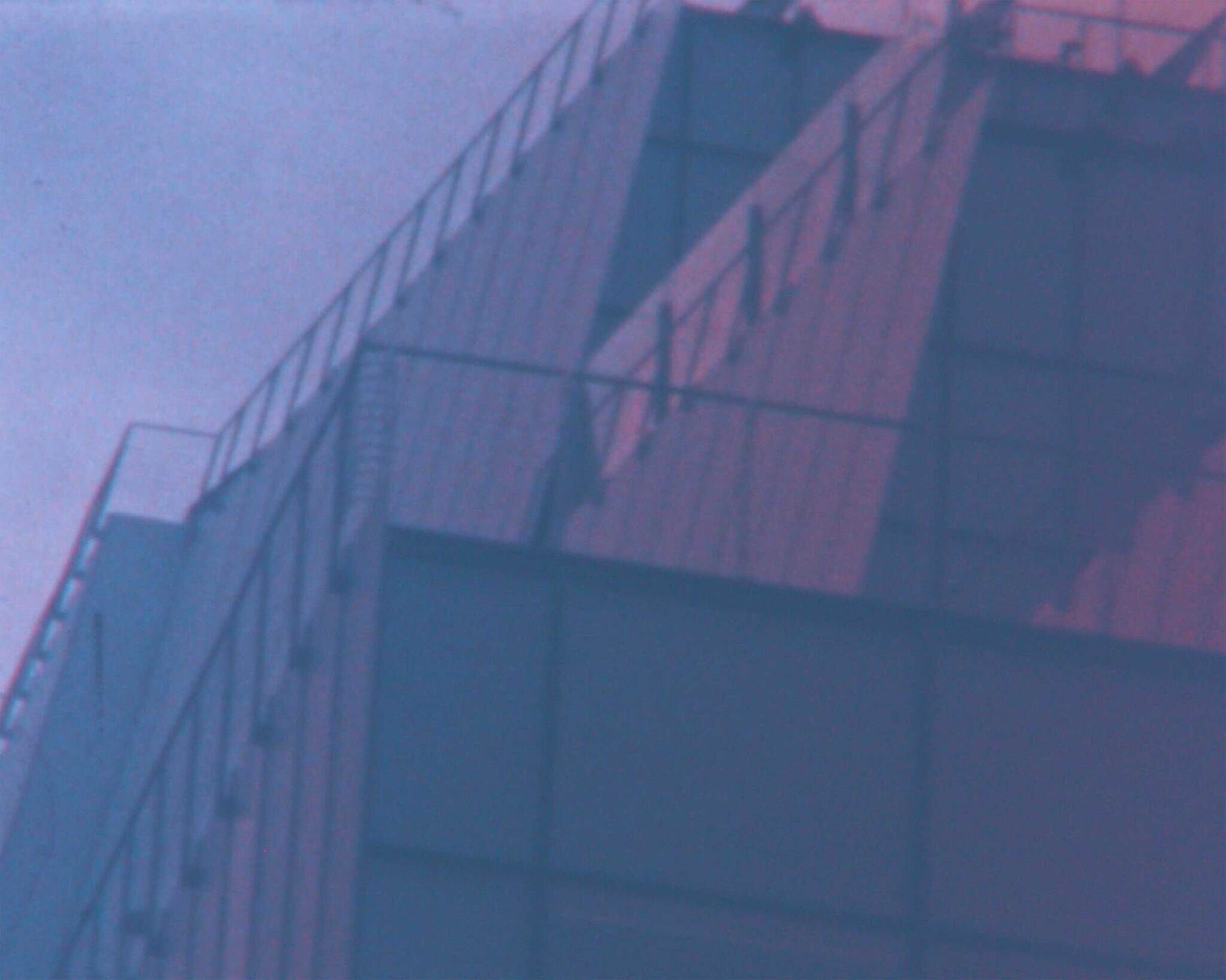 A gradient field of warm, fading light washes across one of the Whitney Museum’s outdoor terraces, where architecture and sky merge at dusk. The image marks a choreographic vantage point in magic hour–golden time, scoring the relationship between light, duration, and the body in space.