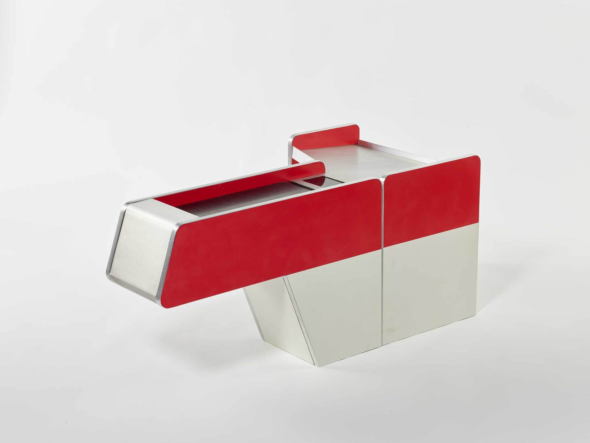 Two modern red and white modular cabinets with raised top panels and angled bases.