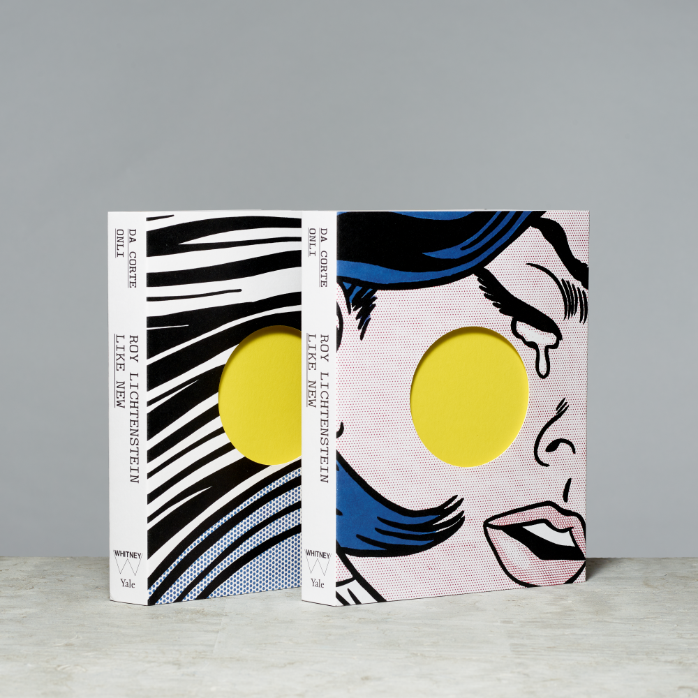 A hardcover book about Roy Lichtenstein with pop-art crying woman and a bold yellow circle.